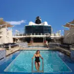 Woman getting out of the Pool onboard Celebrity Equinox, Swimming, EQ, Solstice Class